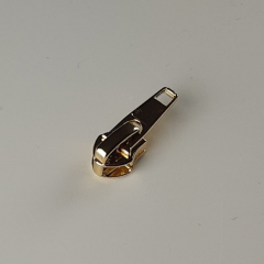 1 Schieber fr 1 m Reiverschluss metallisiert GOLD 6,5 mm Spirale